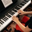 school-boy-playing-synthesizer-at-home